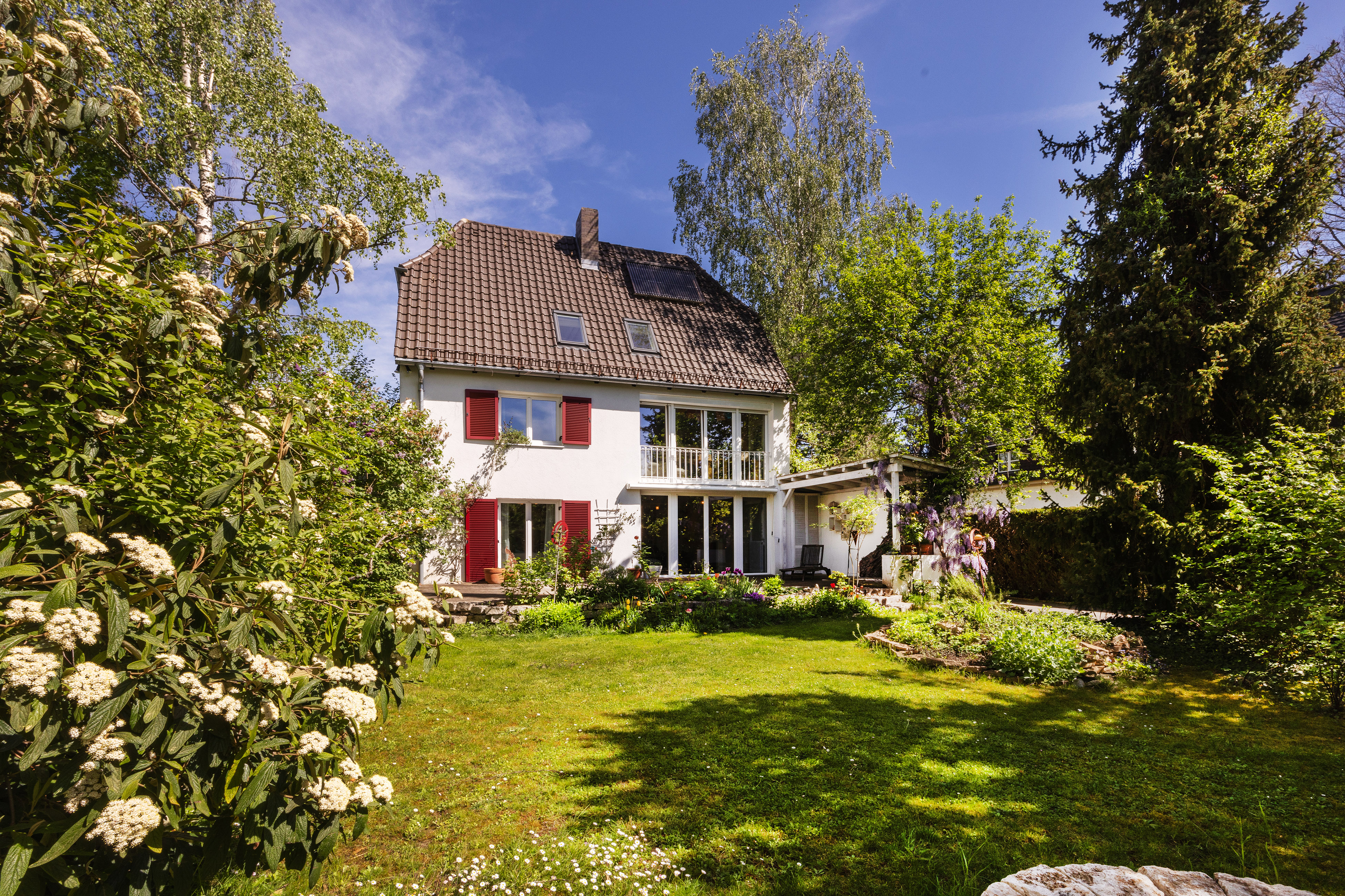 Charmantes Einfamilienhaus mit traumhaftem Süd-Garten in Bestlage von Gräfelfing